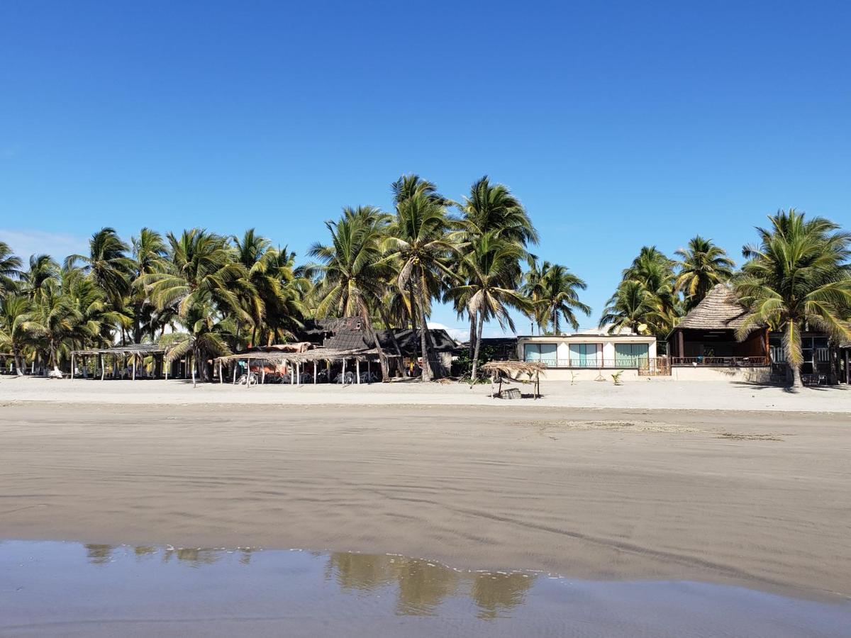 Bungalows La Perla Playa Azul Esterno foto